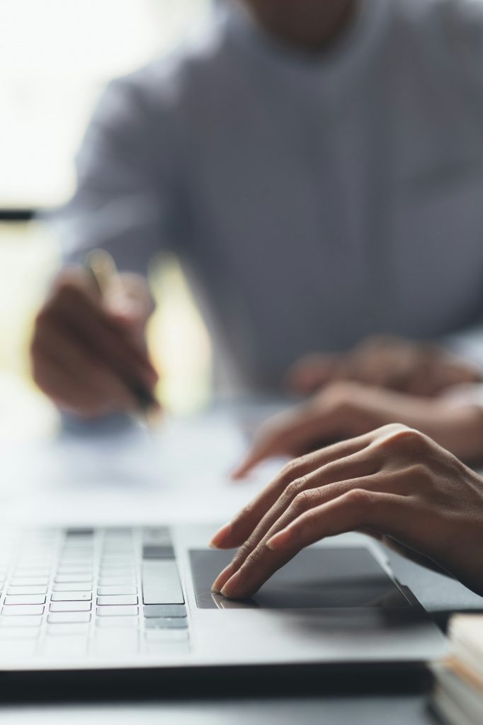 A business man is checking company financial documents.